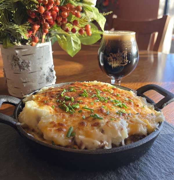 Southwestern Cottage Pie by Copper Brothel Brewery: a corn tortilla crust with beef, green chiles and corn filling, covered in creamy mashed potato’s and melted cheese